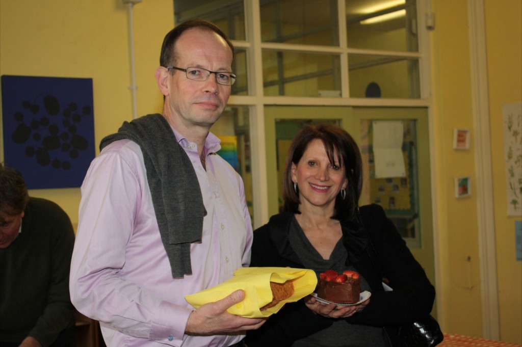 Robert Gorrie and Lynne Featherstone make off with the left overs of Lucy Rea's cakes
