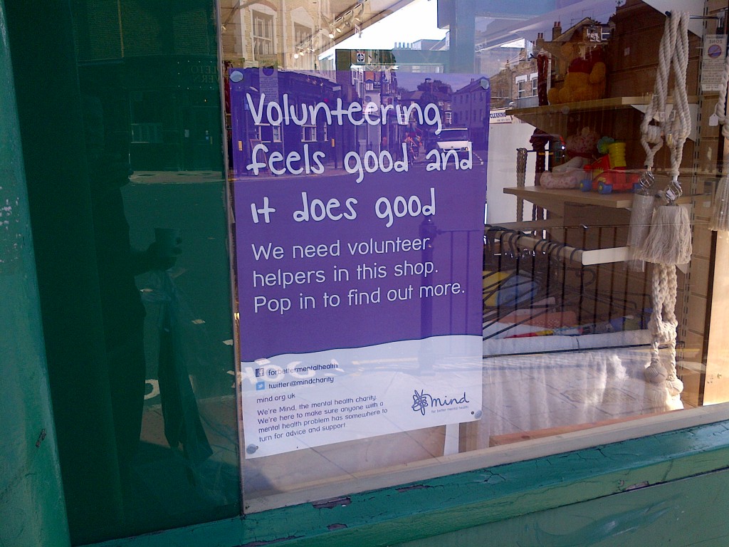 Volunteering poster in Mind charity shop