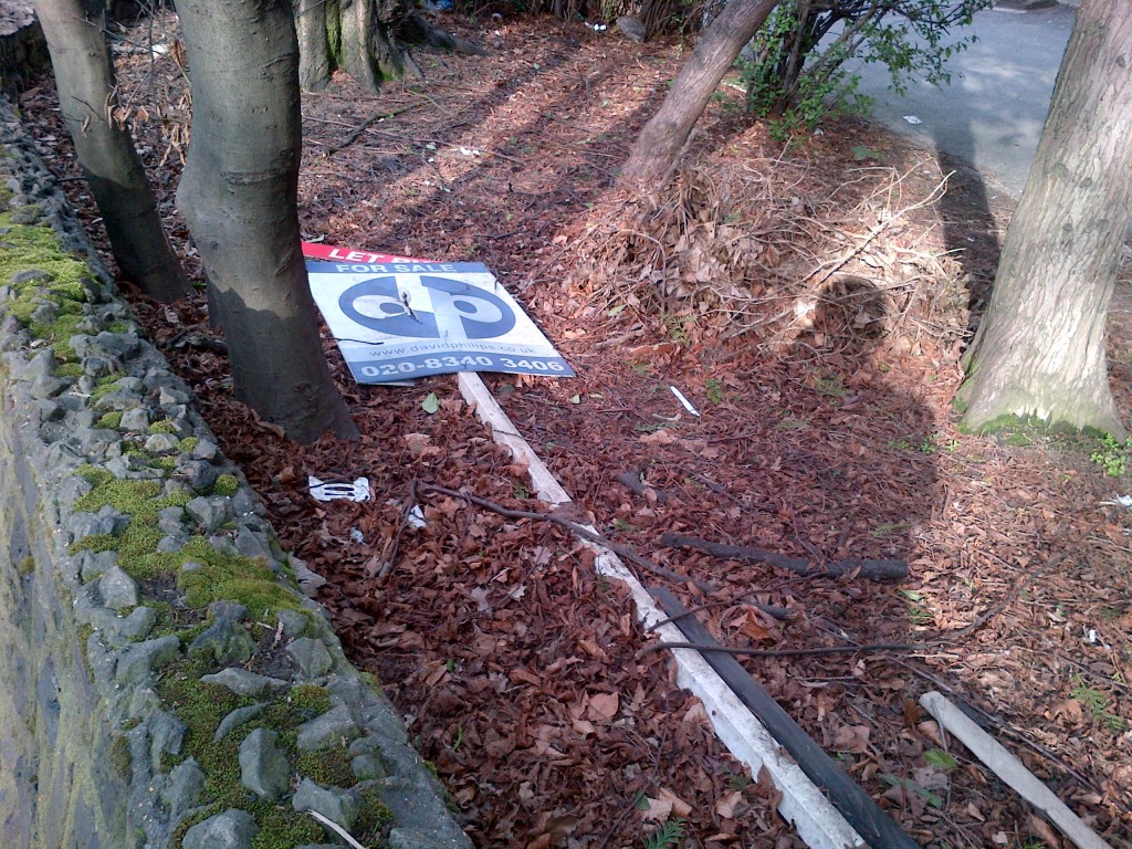 Dumped David Philips estate agent board, Crouch End Hill