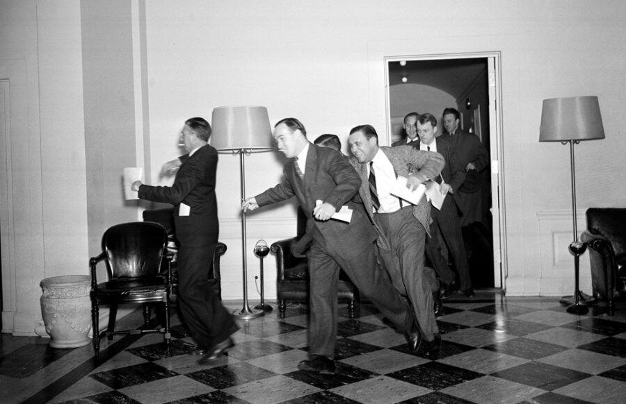 White House Press Corps after being told of attack on Pearl Harbour. Photo via https://twitter.com/RealTimeWWII/status/409434681256321025/photo/1/large