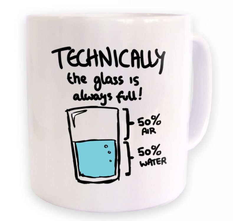 Mug with a 'Technically the glass is always full' cartoon on it