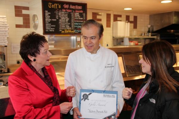 Sarah Ludford and Lynne Featherstone at fish and chips shop in Muswell Hill