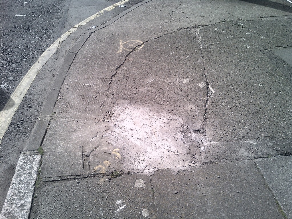 Empty pavement, corner of Marquis Road and Stroud Green Road 