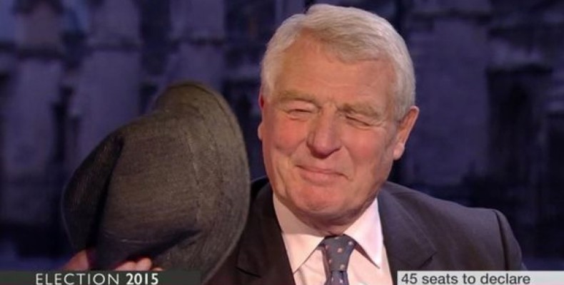 Paddy Ashdown presented with a hat after promising to eat one of the general election exit poll was right