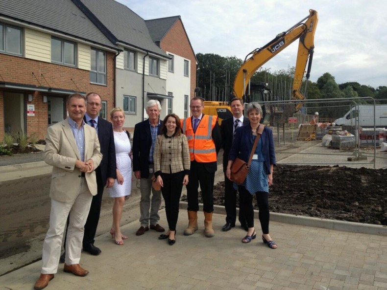 Keith House (left) and Natalie Elphicke with representatives from Keepmoat and Barratt at new homes in Newcastle, July 2014