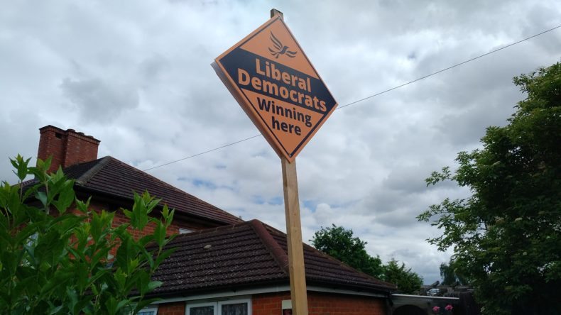 Liberal Democrat winning here election poster in garden