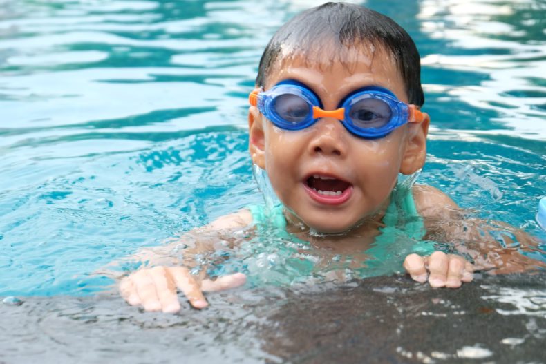 Child in a swimming pool - photo used under the Pexels License
