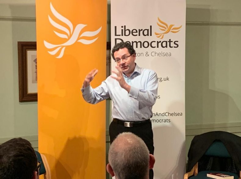 Mark Pack speaking at Kensington and Chelsea Liberal Democrats and waving his hands