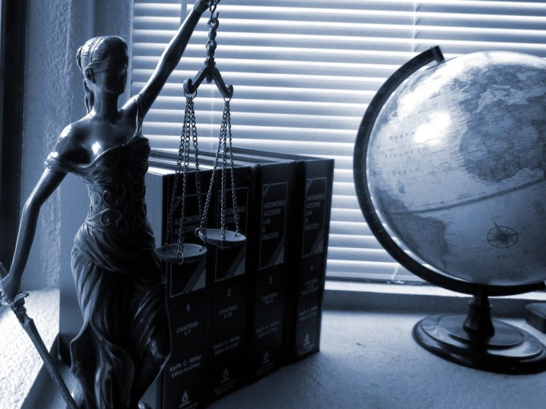 Lady Justice statue on a desk - photo from Pixabay and used under the Pixabay license