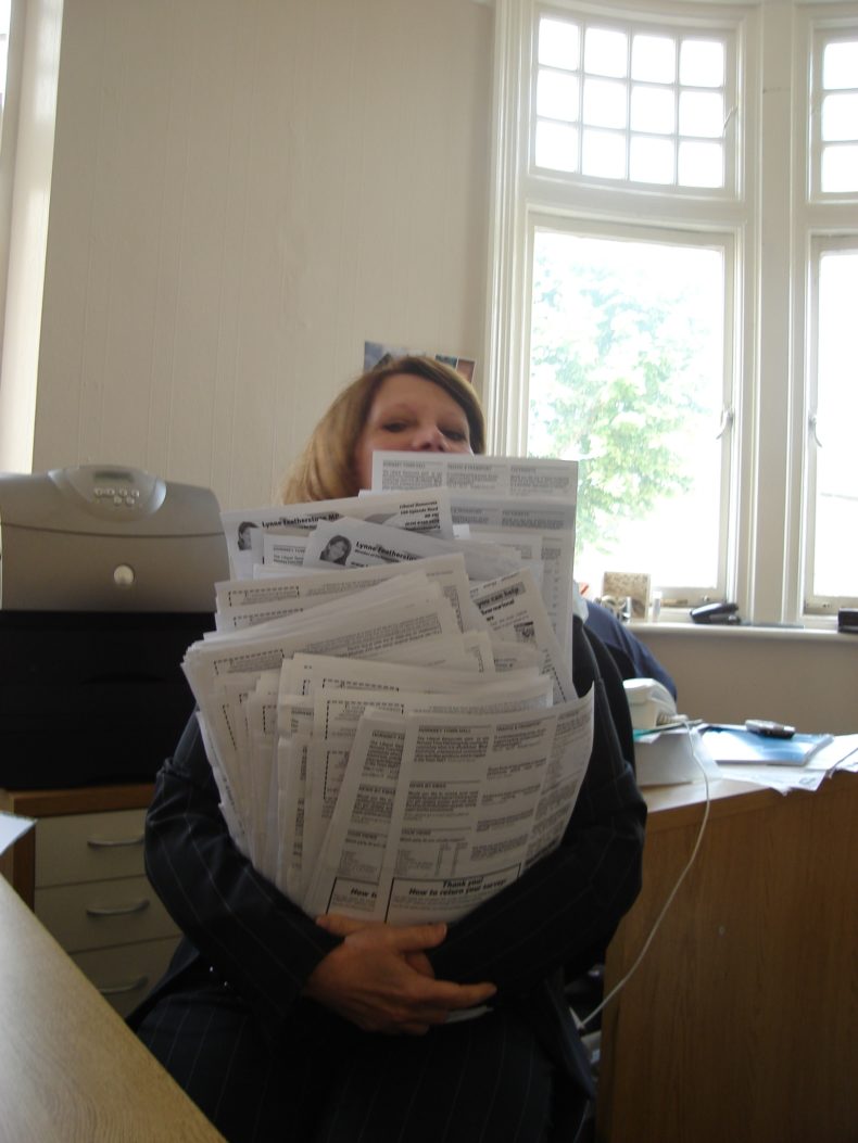 Lynne Featherstone with armfuls of residents surveys in 2007