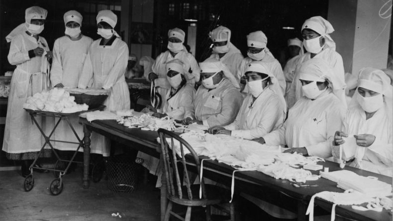 Red Cross workers making anti-influenza masks for soldiers in Boston, Massachusetts - public domain photo via the US National Archives